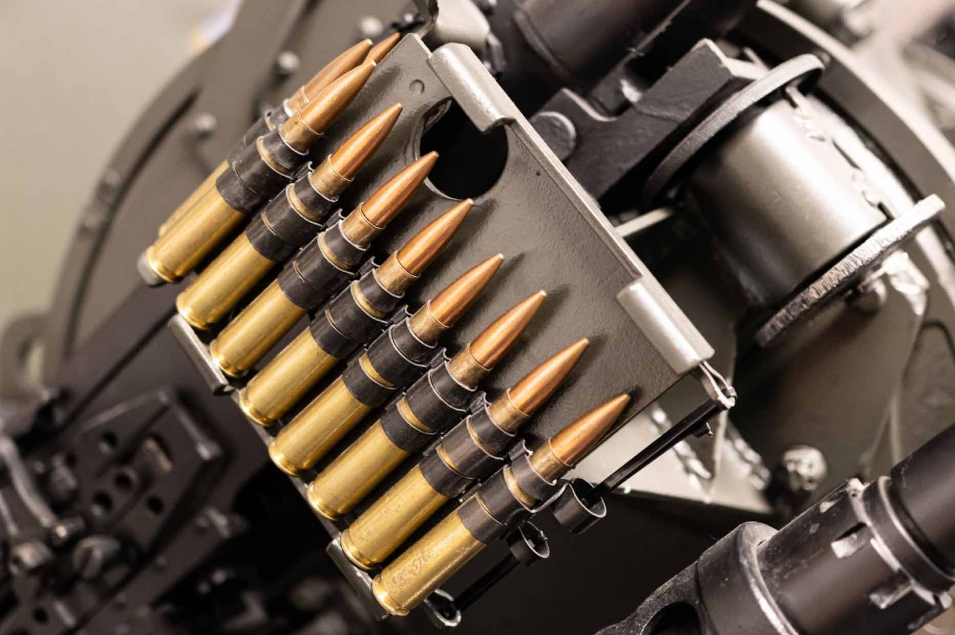 A close-up view of bullets in a coaxial machine gun belt.
