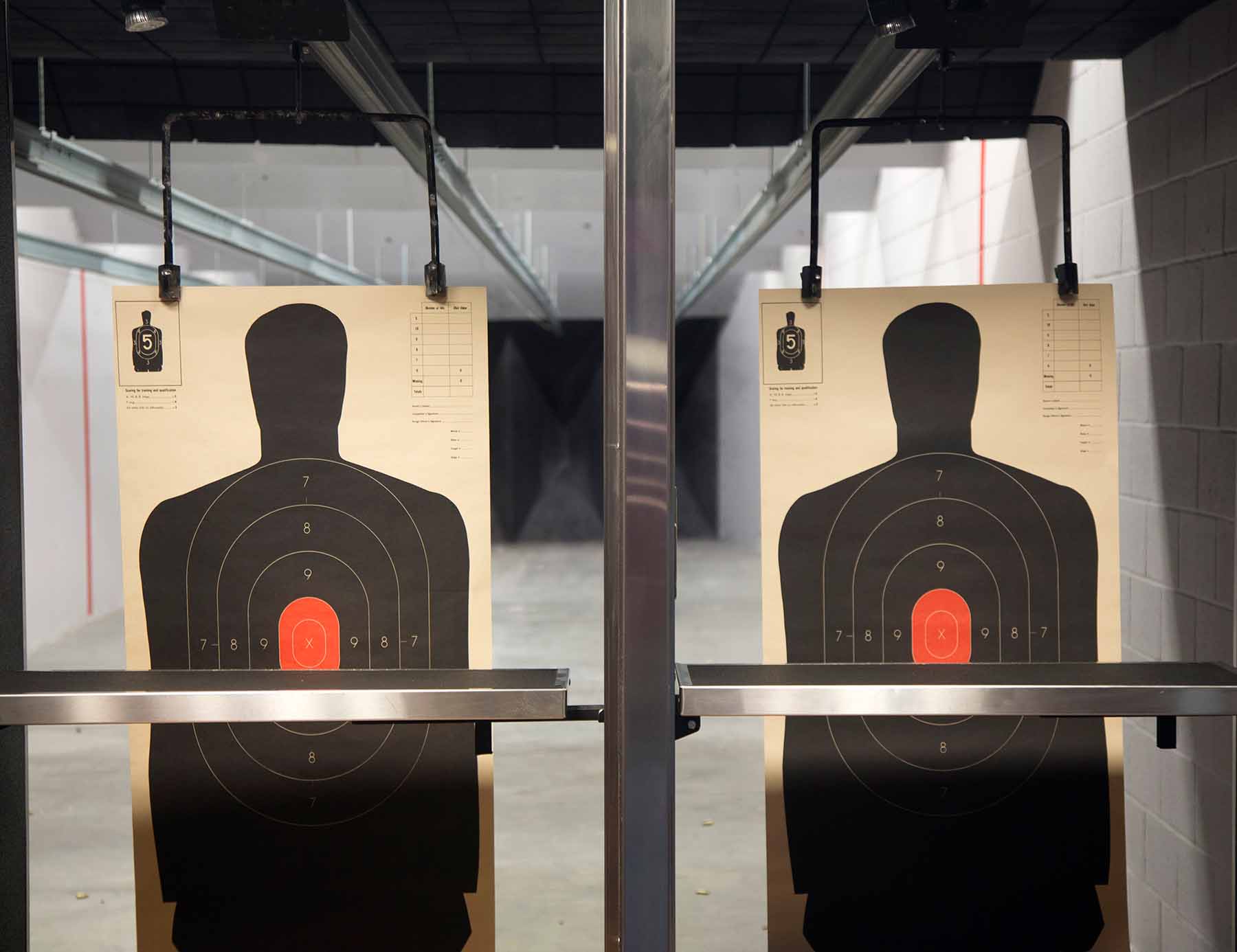 A closeup shot of two targets at a shooting range.