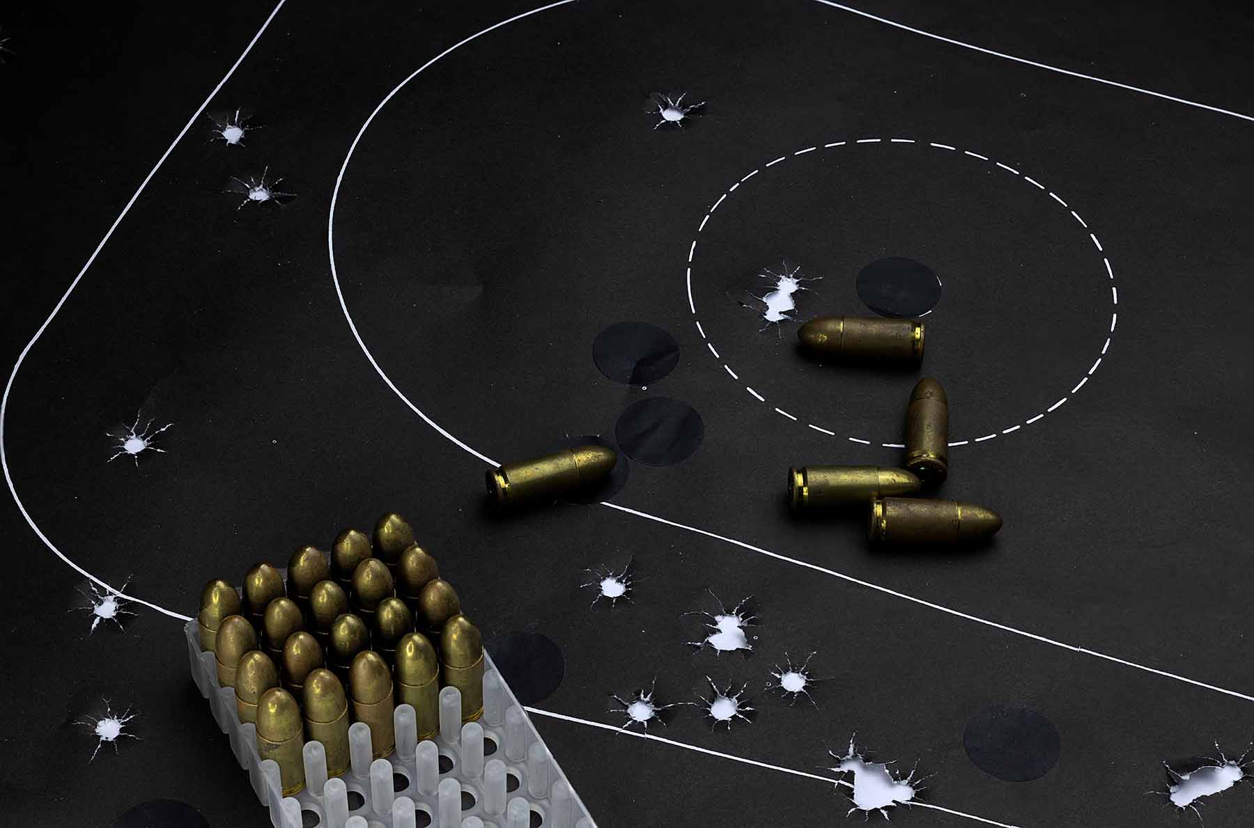 A high-angle shot of ammo on a target board.